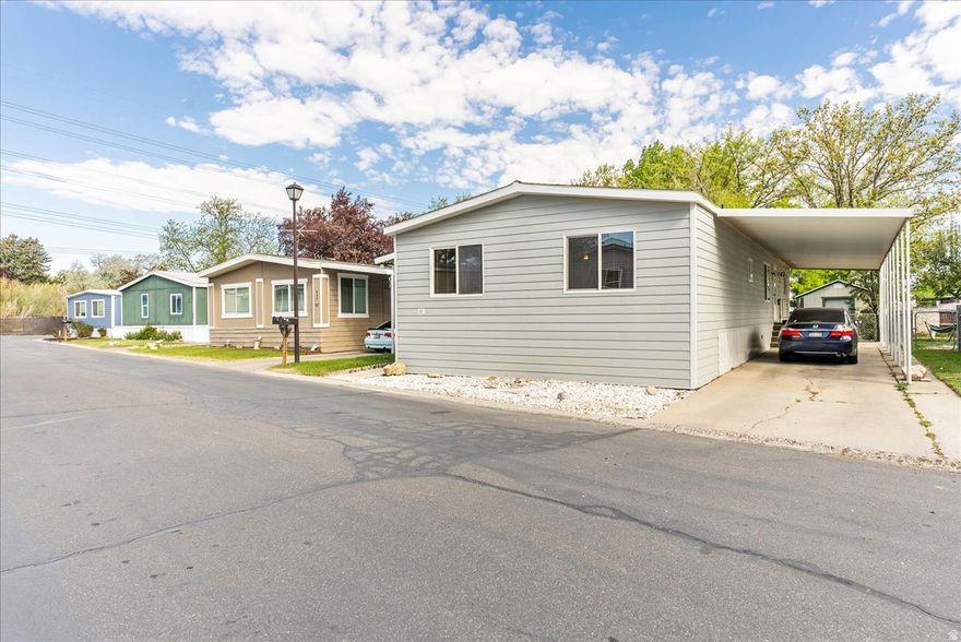 Spacious 1,440 sq ft manufactured home as measured in a recent appraisal. You will feel the size immediately upon entering with an open floor plan, oversized bedrooms, and a large kitchen island that flows into a spacious semi formal dining area. This well maintained home features insulated siding with added R value, durable aluminum skirting, and a newer roof approximately 5 years old. Mechanical updates include a newer furnace installed approximately when the current owner purchased the home, an A C condenser approximately 2 years old, and a water heater replaced approximately 5 years ago. Interior improvements include updated Simonton windows in the living room and kitchen installed approximately 3 years ago. The property also includes an impressive storage shed with power and lighting, featuring a heavy duty metal roll up door with secure locking capability. Community amenities include access to a clubhouse. Buyer to verify all information.