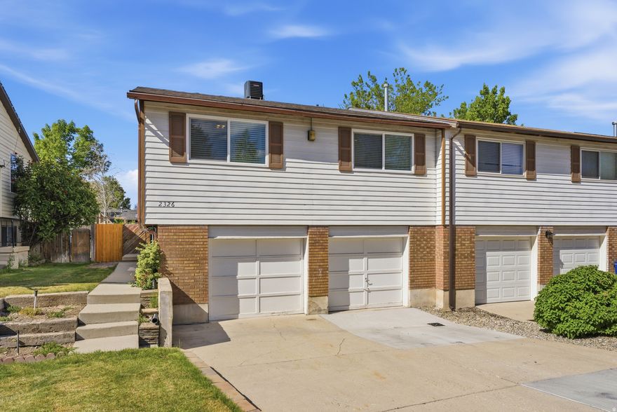 Welcome to your beautiful Taylorsville home-where comfort, style, and opportunity come together. Steps away from Salt Lake Community College. This property offers a rare chance to supplement your income with a private studio apartment featuring its own separate entrance, typically renting for $900$1,100 per month.  Enjoy the freedom of no HOA and a spacious yard perfect for entertaining, relaxing, or future possibilities. Inside, you'll find thoughtful updates throughout, including new windows, new AC, new furnace, new carpet, fresh paint, and updated lighting, creating a move-in ready experience.  The two-car garage adds convenience and storage, while the versatile layout makes this home ideal for homeowners or investors alike.  Live comfortably while generating income-this is Taylorsville living at its best.
