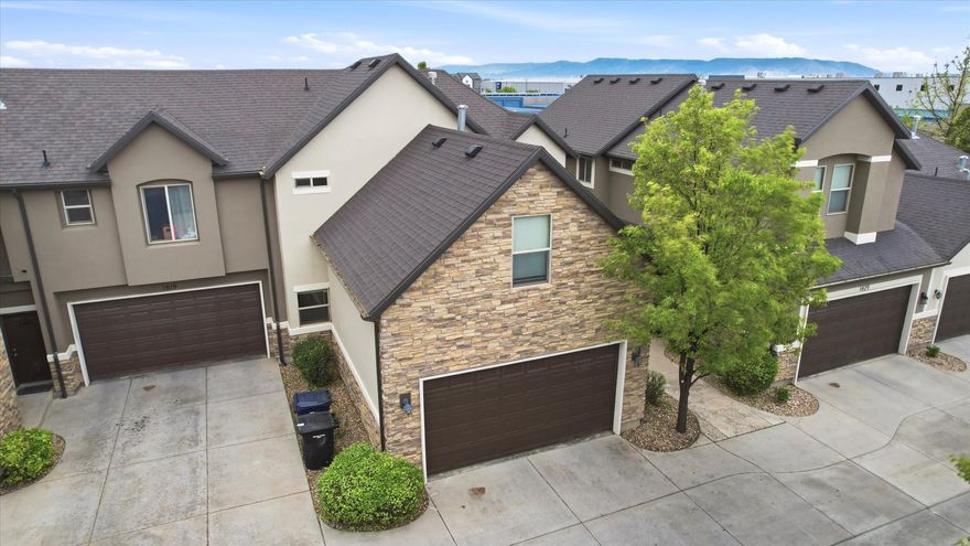 Tucked inside a well-maintained private townhome community, this home offers a comfortable layout, a welcoming open feel, and access to great neighborhood amenities including a community pool and playground. The main living area features high ceilings that make the space feel bright and open, while the included newer appliances add everyday convenience.  The location is a major plus. Just minutes from Redwood Road, I-15, and Legacy Parkway, this home makes commuting simple whether you're heading into Salt Lake City, Salt Lake City International Airport, or north toward Hill Air Force Base. You'll also appreciate the tucked-away setting while still being close to shopping, dining, schools, parks, and everyday essentials.  A great option for buyers looking for low-maintenance living, convenient freeway access, and community amenities in a quiet Woods Cross location.  Square footage figures are provided as a courtesy estimate only and were obtained from county records. Buyer is advised to obtain an independent measurement.