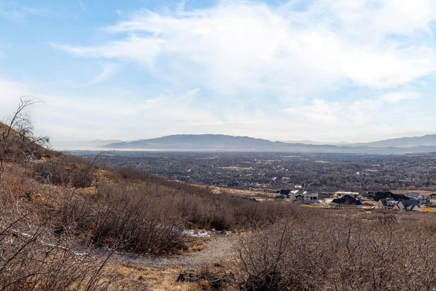 Perched at the top of Box Elder luxury estates, this 1.4-acre cul-de-sac homesite has unobstructed views of gorgeous Utah Valley -- all this, and no HOA $0.00! The property is ideally situated near a variety of educational options, including American Heritage, Challenger School, Mountainville Academy, and Lincoln Academy, offering flexibility for a range of educational preferences. Buyer to verify school information. Bordered on the south by national forest property and on the east by Box Elder peak, this lot offers exceptional privacy and a true mountain lifestyle. Convenient access to American Fork Canyon, Silicon Slopes, and I-15, shopping and restaurants. Year-round recreation and stunning sunset views. Acreage is provided as a courtesy estimate only and were obtained from County Records. Buyer is advised to obtain an independent measurement.