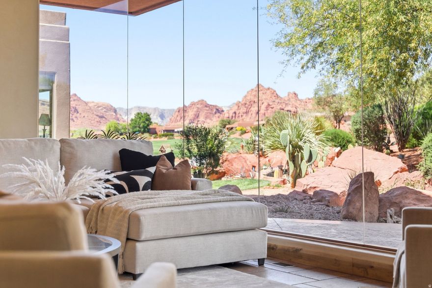 Set within the sought-after community ofEntrada at Snow Canyon Country Club, this home offers a rare position backing directly to the 7th tee box with unobstructed views stretching across the course and into Snow Canyon. The layout features 3 bedrooms and 3 bathrooms, designed for comfortable everyday living or easy hosting. Large windows bring in natural light and frame the surrounding landscape, creating a strong connection to the outdoors from nearly every space. Enjoy elevated desert living with striking lava rock, red mountain backdrops, and one of Southern Utah's most iconic golf courses right out your backyard.