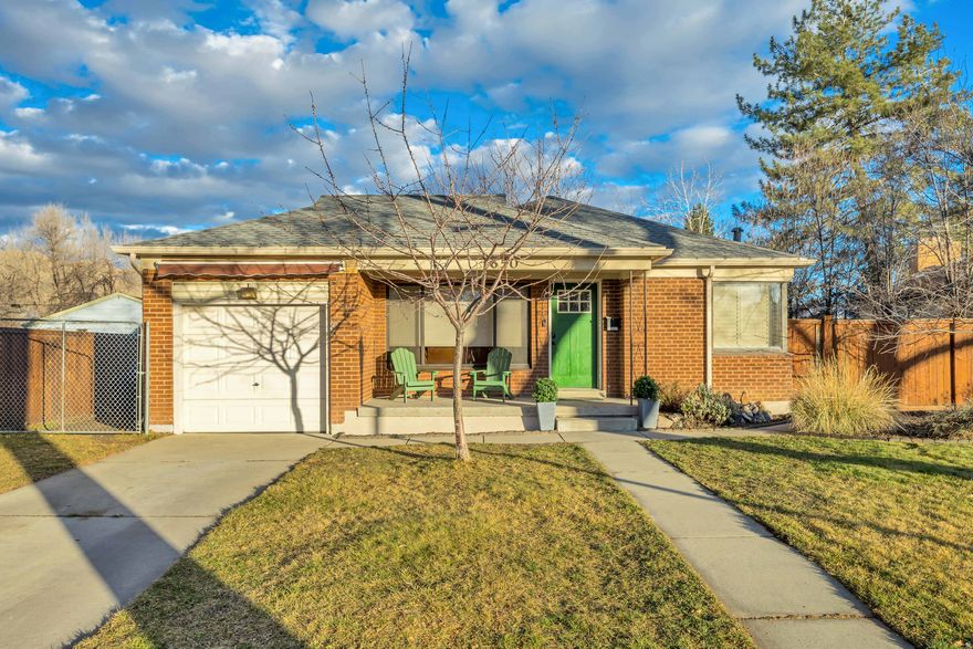 Welcome home to this cute and stylish bungalow nestled in the heart of Rose Park, where classic charm meets modern convenience. Just minutes from downtown, shopping, parks, and local entertainment, this west-facing home offers the perfect blend of city access and neighborhood living. Step inside to a thoughtfully designed layout where the living room and kitchen flow effortlessly together, creating a warm and inviting space ideal for everyday living and entertaining. Plantation shutters, carpeted living areas, ceiling fans, and a smart thermostat provide comfort and efficiency year-round. The kitchen is equipped with a range and range hood, making it both functional and welcoming. The upper level features two comfortable bedrooms and a full bathroom, while the lower level expands your living options with an additional bedroom, bathroom, family room, and a massive bonus space, perfect for storage, a home gym, office, or cozy den. Outside, the fully fenced backyard is truly a standout. Spacious and private, it has been a dream for the sellers and their pets, offering plenty of room to play, relax, or entertain. Mature fruit trees, including cherry and apricot, along with grapevines add charm and seasonal enjoyment. Additional features include an open front porch, concrete driveway, a garage with built-in storage/loft  and workbench, and a storage shed for all your extras. This gem delivers comfort, character, and versatility in a highly desirable location, an excellent opportunity for either a first time homebuyer or investor looking for rental . Square footage figures are provided as a courtesy estimate only and were obtained from county records.  Buyer is advised to obtain an independent measurement.