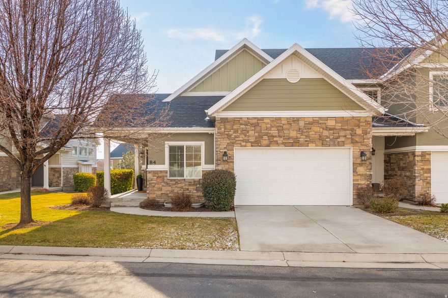 Welcome to this meticulously cared-for end-unit rambler townhome, a rare gem in the area with true single-story main-floor living! Perfectly situated in a fun yet peaceful neighborhood close to everything you need, this bright and spacious 4-bedroom, 2.5-bath home features soaring vaulted ceilings and an open-concept layout for an airy, inviting atmosphere. Enjoy recent updates throughout for modern comfort and style. As an end unit, you'll appreciate the added privacy, extra natural light from generous windows, and effortless one-level flow-no stairs to navigate! The grounds are beautifully maintained, offering serene outdoor enjoyment without the upkeep. Don't miss this move-in-ready rare find!