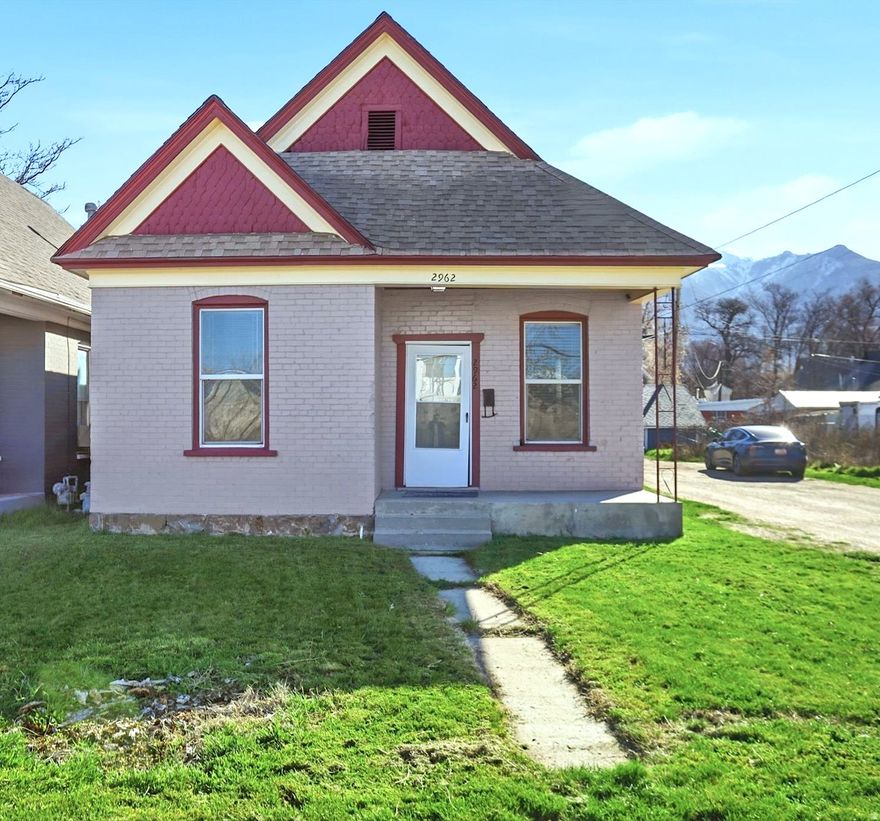 Charming, fully updated 2-bedroom bungalow located on a quiet street, blending timeless character with modern comfort. Inside, you'll find tall ceilings and large windows that fill the home with natural light, creating an open and inviting feel throughout. The home was extensively remodeled in 2015 with new windows, roof, electrical, and plumbing, giving peace of mind while preserving its classic charm. Recent owner upgrades include central air conditioning, a large cement parking pad with space for two cars, complete with a sliding privacy gate, LVP flooring in the laundry/mudroom area, and fresh paint. This property offers the perfect mix of historic charm and thoughtful updates, making it an ideal place to call home.