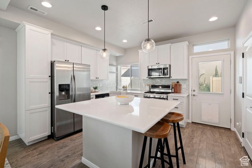 Feels like sunshine every day in this charming new home nestled in the heart of American Fork! Designed with quality workmanship and an open, airy floor plan, this home offers the perfect blend of comfort and style. The kitchen shines with granite countertops, a spacious island, stainless steel appliances, and beautiful flooring that flows throughout the main level. Upstairs, the inviting primary suite includes a double vanity, oversized walk-in shower, and generous closet space-with laundry conveniently nearby. The corner lot location offers stunning mountain views and a fully fenced yard that's delightfully low-maintenance yet roomy enough to BBQ, relax, and entertain under the Utah sky. Enjoy modern living with small-town charm-close to shopping, schools, and commuter routes for easy access everywhere you want to be!