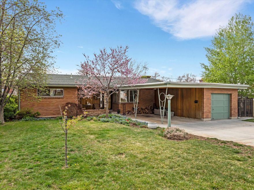 Lovely and serene and beautifully kept, this spacious (just shy of 2,900 sqft) mid-century home is located deep in the quiet heart of one of Salt Lake's most desirable neighborhoods. Suffused with natural light, this home has spacious rooms, a three-season sheltered back pation,  and an easy flow that makes it perfect for entertaining or just quiet, private enjoyment. Please also notice the so hard to find genuine mid-mod design elements: the never-been-painted combed cedar, the original fireplaces, the to-the-ceiling kitchen cabinets, and the classic built-ins. There's a practical mud-room/pantry just off the kitchen and the attached garage. Downstairs find a lovely family room, a huge bedroom suite, and plenty of room to grow. Glowing refinished hardwood floors, freshly carpeted, and with an ideal floor plan, (3 spacious bedrooms and two large baths up, and a huge bedroom suite and family room down) this home offers tremendous upside for a discerning buyer.