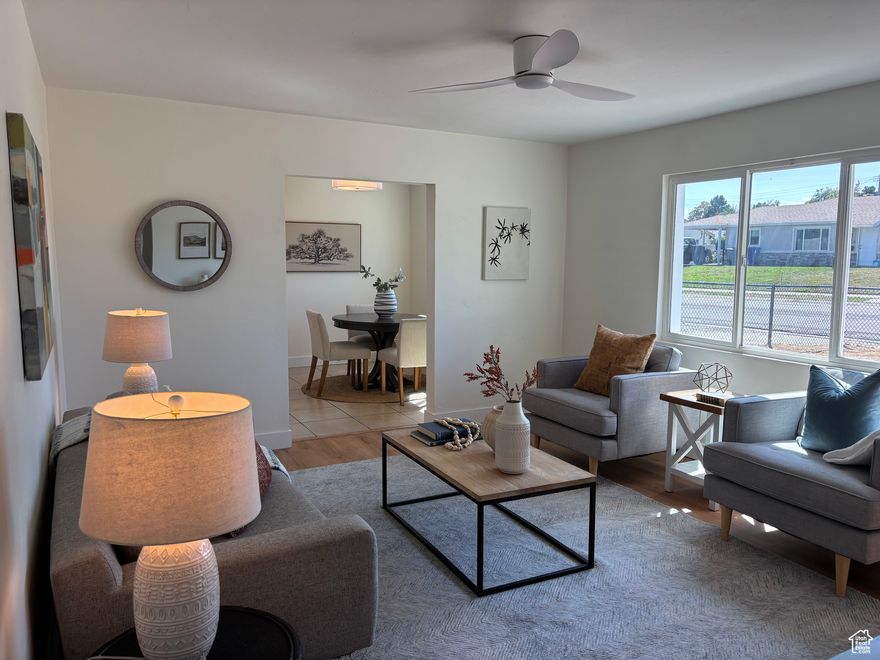 This move-in ready home offers the ease of single-level living with thoughtful upgrades inside and out-plus plenty of bonus space to fit your lifestyle. Recent improvements include new windows, interior and exterior paint, LVP flooring, carpeting, lighting, interior doors, door knobs, and a modern electrical panel. The kitchen shines with newly installed cabinets, open shelving, sleek countertops, and updated dishwasher and disposal. Bathrooms feature new low-flow toilets, vanities, and fixtures. The orientation of this home is my favorite, south facing front yard for extra light in the living room and kitchen, and north facing backyard for nice shade in the summer. This home has more space than standard homes in the area. A spacious family room with fireplace and French doors opens to a deck, creating the perfect floor plan flow to the backyard. Three bonus areas add incredible flexibility: a nursery, exercise space, craft room, or playroom; a separate office or storage room. The half bathroom in the primary suite with an adjacent closet that could be converted into a shower for a full ensuite. Practical upgrades bring peace of mind, including a new water heater, main water valve and pressure regulator,  turn shut-off valves with updated pipes and drains, plus professional vent cleaning. Energy-efficient French patio doors, a new porch light, soft linen exterior paint, and termite treatment with a transferable 10-year warranty are already done for you.The roof, rain gutters & furnace have been replaced recently also. Outside, the property offers excellent functionality with driveways on both sides-ideal for extra parking, a trailer, or RV-and fully fenced front and backyards for privacy and security. This home is as practical as it is stylish, offering comfortable living with upgrades and extra spaces ready to meet your needs. Walking distance to the neighborhood grade school is a plus!  Square footage figures are provided as a courtesy estimate only. Buyer is advised to obtain an independent measurement.