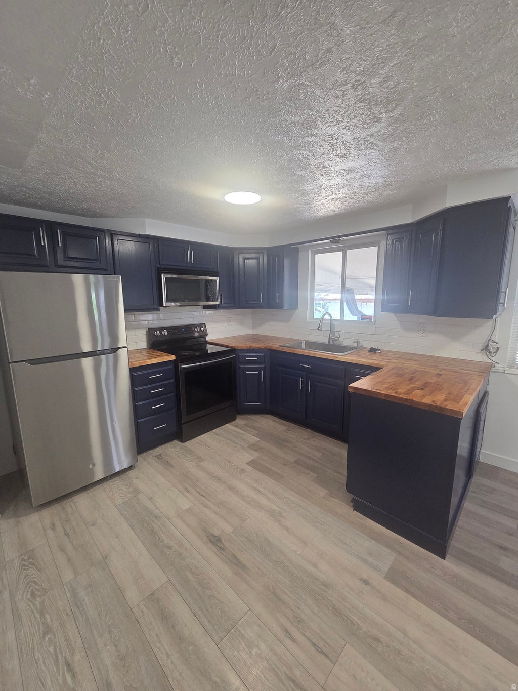 Photo of 3058 W MINUET AVE S, West Valley City, UT 84119 (MLS # 2183793)