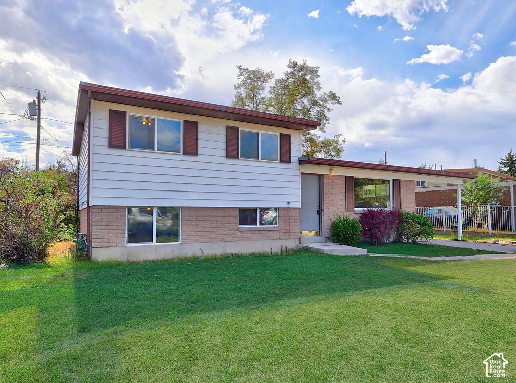 Photo of 6257 W 3570 S, West Valley City, UT 84128 (MLS # 2190850)