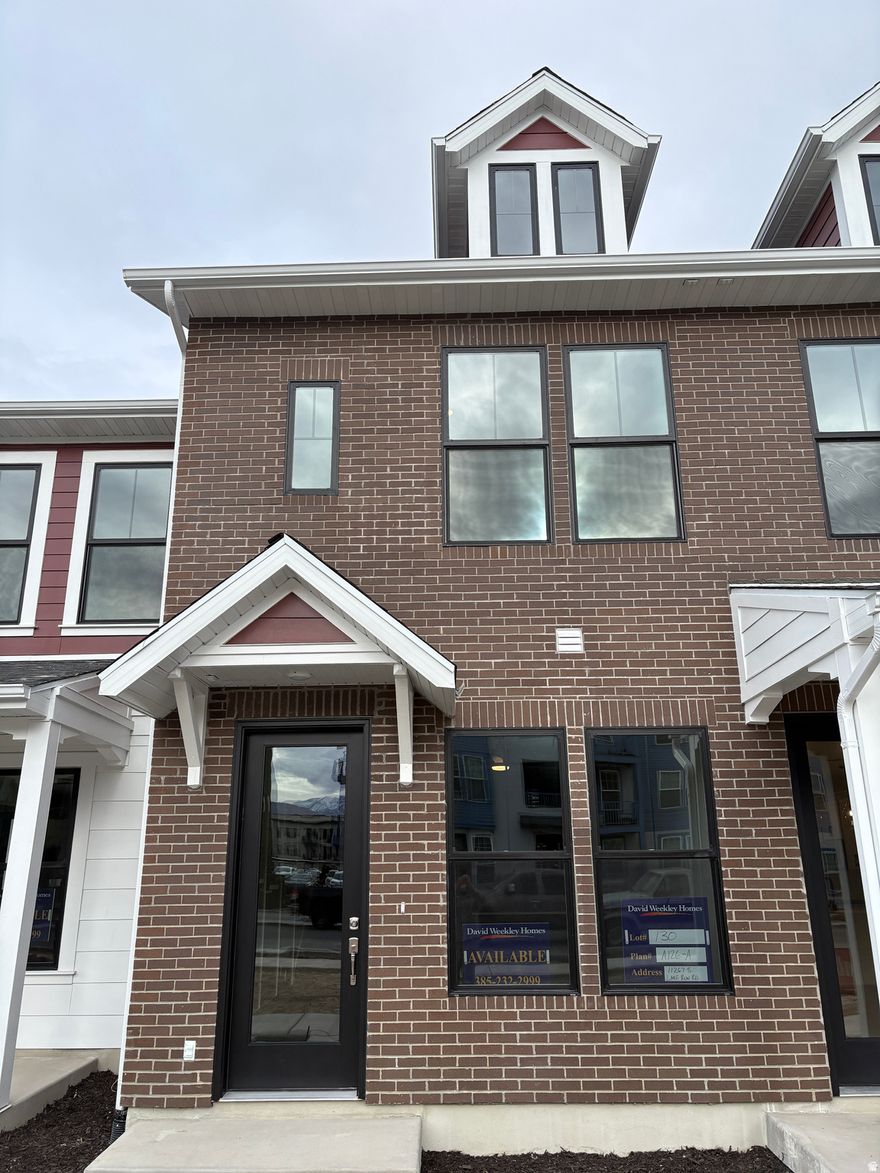 Move In Ready NOW! LOCATION! LOCATION! LOCATION! Final opportunities for a brand new home on the east side of Daybreak, located in the exciting Downtown Daybreak area. This home offers: main living area on the first floor, 3 suites, versatile loft, 9' ceilings throughout, EV-Charger ready, and professionally curated finishes, just to list a few.