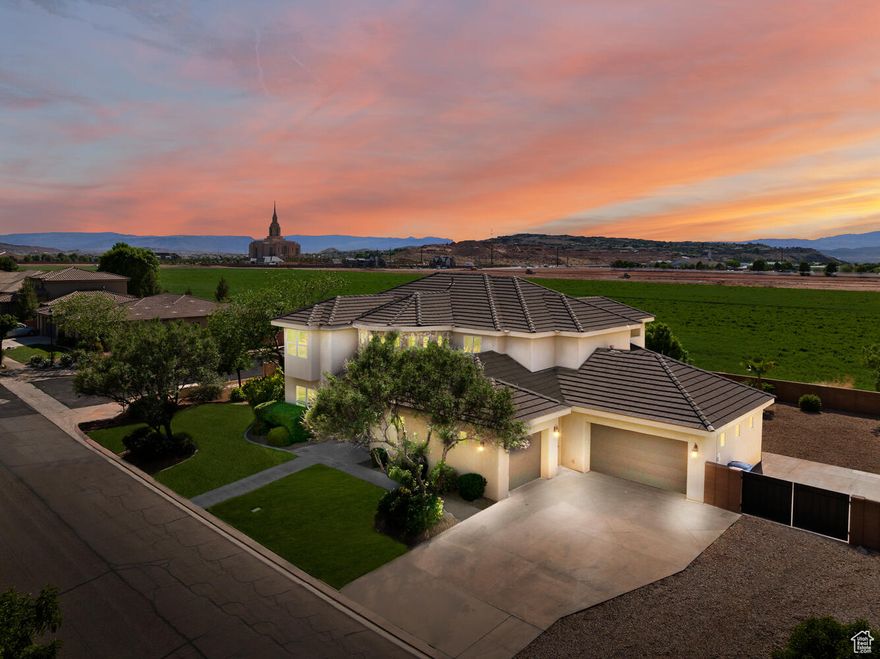 Enjoy peaceful living with room to grow in this beautifully renovated 5-bedroom home in the scenic Daybreak Park subdivision of Washington Fields. Set on a spacious 0.38-acre lot with open views, this home blends modern upgrades with timeless comfort. Step inside to soaring ceilings, brand-new paint, and stylish new flooring throughout. The dramatic two-story foyer welcomes you with natural light, a grand staircase, and a seamless flow into the living room-where a floor-to-ceiling fireplace anchors the space. The open layout extends to a formal dining area and out to a private patio, perfect for entertaining.  The kitchen comes with high-end appliances, granite countertops, a large breakfast bar, custom tile backsplash, and dual Bosch wall ovens. The main-level primary suite offers a spa-like retreat with patio access, soaking tub, walk-in shower, dual vanities, and an organized closet. You'll also find a dedicated office, additional room, powder bath and mudroom on this floor. Upstairs includes three spacious bedroomsone with a private en-suite, and two sharing a Jack-and-Jill bathplus a laundry room and a covered balcony with views. The oversized 3-car garage includes rear access and extra space for storage or hobbies. The large yard has room for a pool, includes RV parking and gated access. Located within the highly rated Crimson Cliffs High boundaries and just steps from Washington Fields Intermediate, this home is also near the community park, riding trails, and Southern Utah's favorite outdoor playgrounds: Quail Creek, Sand Hollow, and Zion. This is a home that feels as good as it looksmove-in ready and made for living.