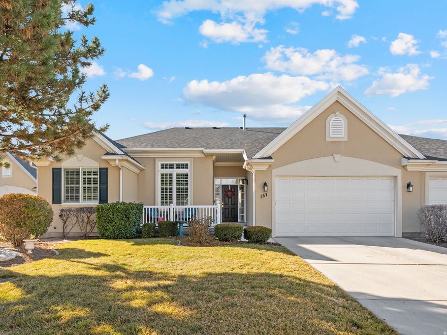 This stunning rambler is located in the highly sought-after, gated, and private **Cottages on Kimball's Lane** community in Draper, offering the perfect blend of privacy, convenience, and main-level living. Situated on a quiet cul-de-sac, this spacious and move-in-ready home features 10-foot ceilings, expansive windows, a formal entry, a large living room with vaulted ceilings with a dedicated office or flex space.  The main-level primary suite is generously sized and includes a luxurious en-suite bathroom with a  oversized walk in shower, and walk-in closet. A second bedroom, full laundry room, kitchen, and dining area complete the main floor. Step outside to enjoy the large, private Trex deck-perfect for relaxing or entertaining.  The lower level is designed for hosting and extended living, offering a massive family and entertainment room, additional large bedrooms and full bathroom, plus abundant storage and a workshop area.   A two-car garage and two car driveway adds even more functionality. This home truly delivers single-level living at its finest while still providing ample space for guests or family. Conveniently located near Lone Peak Hospital, Trax, shopping, dining, entertainment, and quick freeway access. While it could suit a 55+ lifestyle, this is **not** a 55+ community and is enjoyed by residents of all ages. Low maintenance, secure, and ideally located-this home checks every box. Welcome home.