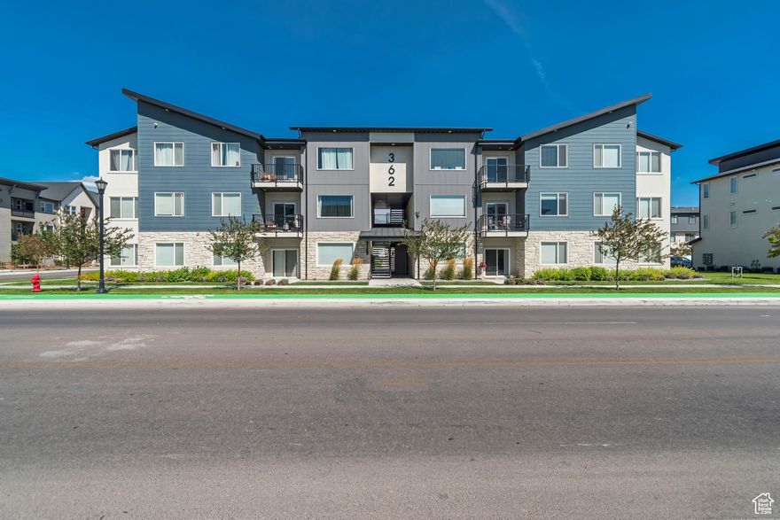 Welcome to this beautiful, mountain view condo! The views from this luxury home are incredible! Step in and find a welcoming open floor plan that flows into the family room, dining room and stunning kitchen with its soaring vaulted ceilings, beautiful cabinets, quatrze counter tops and huge windows that flood the space with natural light. Every detail has been elevated! Down the wide hallway you will find the laundry room, two ample sized bedrooms with their own views, spacious guest bathroom and lovely master suite with its own private views of the Wasatch mountain front through oversized windows. The built-in garage with added storage plus tandem driveway parking for added function. Just 10 minutes from Silicon Slopes, incredible shopping  and 30 minutes from downtown Salt Lake this location balances work and play with intention.