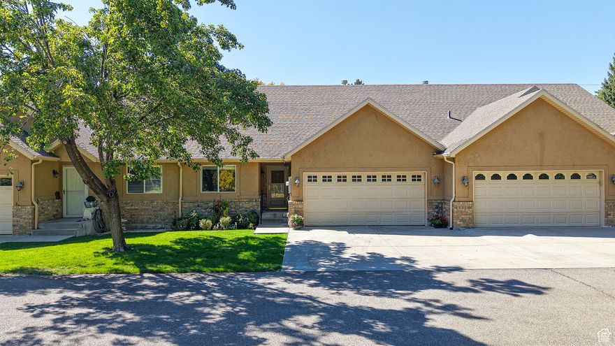 *Click the tour button for the virtual tour* THIS IS A MUST SEE HOME! Discover this extremely special property tucked away on a private cul-de-sac in the heart of Springville! This home is in immaculate condition and offers thoughtful design with property features you won't find anywhere else! Step inside to find two spacious bedrooms and full baths on the main level-a highly sought after layout-along with an expansive finished basement with one more bedroom and full bathroom-offering a possible 4th bedroom and lots of entertainment space! Enjoy the outdoors from your covered deck overlooking a beautifully maintained backyard with flowers and raspberry bushes and a large shared garden/park space exclusive to just three townhomes! Plenty of room for the kids to play or a serene space to enjoy gardening in the raised boxes or relaxing by the fire pit. There is even space for RV paring! This truly is a special property-come see why today!