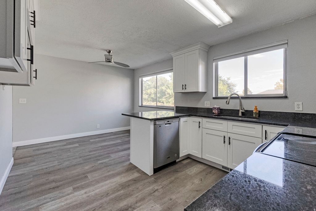 Photo of 3246 W ROYALWOOD DR, Taylorsville, UT 84129 (MLS # 2143169)