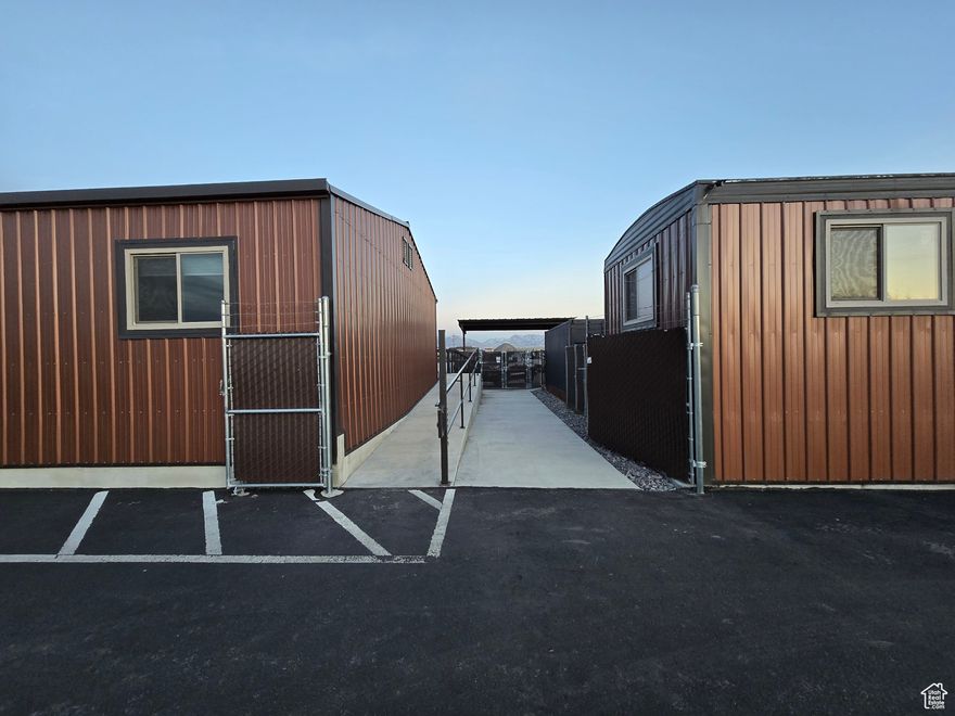 Fantastic lot with water, power, sewer, and electric use as is or build your own building. Seller has approved plans for Salt Lake City  water drains and pumps llots of uses   buyer to verify all