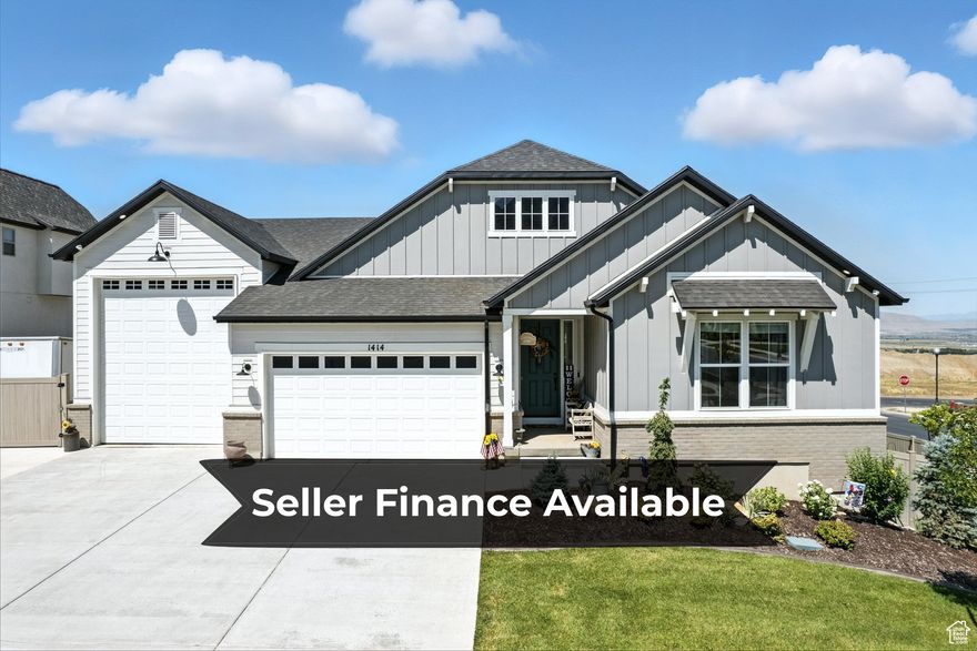 *Seller willing to entertain seller finance offers. Call listing agent with any questions.* Discover this exceptional 4,896 sqft home, meticulously crafted with over $270,000 in premium builder upgrades, plus many more personal upgrades.  Bring all of your toys! This property features a massive attached garage with a 12x14 ft RV door, perfect for securely storing a full-size RV, boat, or other recreational vehicles, along with an additional uncovered RV pad.  Step into your private backyard resort, designed for ultimate relaxation and entertainment. This outdoor oasis showcases a serene, custom-built waterfall, a spacious pergola providing a perfect spot for shaded gatherings, and a dedicated playground for endless fun.  Inside, the heart of the home features dramatic multi-slide glass doors that open to a covered patio, creating a seamless indoor-outdoor living experience with premium kitchen upgrades. The fully finished walk-out basement is an entertainer's dream, complete with a sophisticated wet bar. Luxurious details continue in the deluxe master suite with its coffered ceiling and a spa-like walk-in shower.  No expense was spared on high-end systems, including a water softener, tankless water heater, and a comprehensive smart home structural wiring system. Elegant quartz countertops and premium trim are featured throughout the home, plus so much more. Schedule a showing today to understand the exceptional quality this home provides.