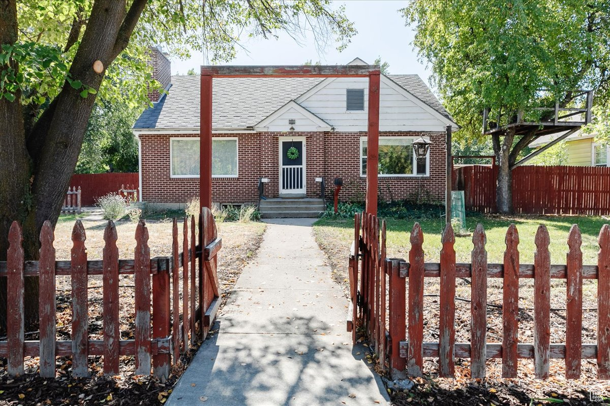 Absolutely charming! This classic brick home with a picket fence has all the features you hope for in a home: beautiful hardwood floors, great outdoor space, right-sized bedrooms, plenty of storage, well-maintained and fully livable. You can't beat this location! A few steps from the Island Market and Central Park, and just a few more to downtown Logan. Easily walk to nearly everything you need. Yet in a completely residential neighborhood. Easy parking off of Center St also. You've got to see this one; it's a whole vibe!