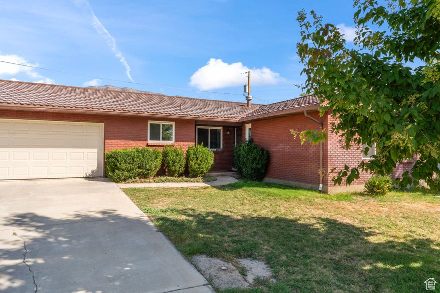 Nestled in the vibrant Orem neighborhood, this turnkey home has been well maintained and modernly updated. This five-bedroom, two-bathroom Rambler/Ranch-style home offers 2,722 square feet of comfortable living space on a spacious 0.26-acre lot. The single-family home features a fully finished basement.  Step inside and you'll discover a wealth of new features throughout. Smart switches provide easy lighting control, while a smart thermostat and Wi-Fi garage door enhance convenience and energy efficiency. Laminate flooring, paint, closet doors, and cabinet have been updated. A Whole Life Roof has been installed, and all solar panels are paid off, significantly reducing your energy bill. The home has been meticulously maintained, so come and see for yourself.