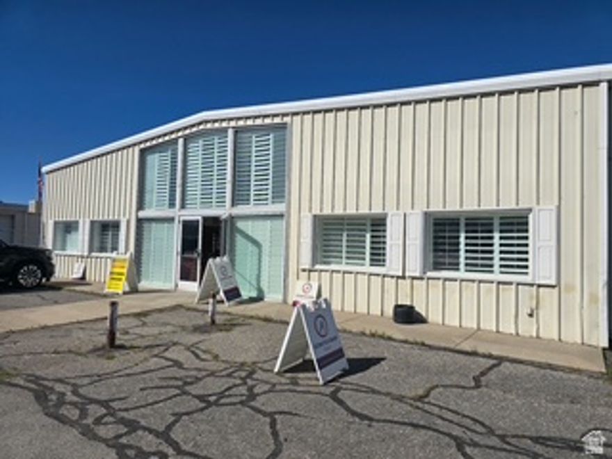 Designed for versatility, this space accommodates a wide range of professional uses including insurance, legal services, salon,  Med spa/aesthetics, and more. Featuring a smart layout with private offices, collaborative areas, and cubicle workstations, it's ideal for both independent professionals seeking functional environment. Fabulous location on 300 West commonly referred to as "Tile Row". This building is situated on a corner lot of 300 West and 1 block South of 3300 South. This building has great frontage on 300 West and very convenient access along 300 West / close to 3300 South and excellent access to I-15 freeway at 3300 South. Built out 4 small offices, break room area, storage as well as almost 1,000 SF of warehouse space. There is a large overhead door that provides convenient use of this warehouse space. An Additional warehouse building directly South may be available for lease as well if additional large warehouse space is needed. Call listing agent to discuss options regarding the additional building and warehouse space. Agent will meet to show the building. Call for an appointment. Do not disturb current occupant. All information is deemed reliable, but is not guaranteed and should be independently verified. https://library.municode.com/ut/south_salt_lake/codes/code_of_ordinances?nodeId=TIT17LAUSDE_CH17.03LAEDIMA_17.03.010LAUSMA