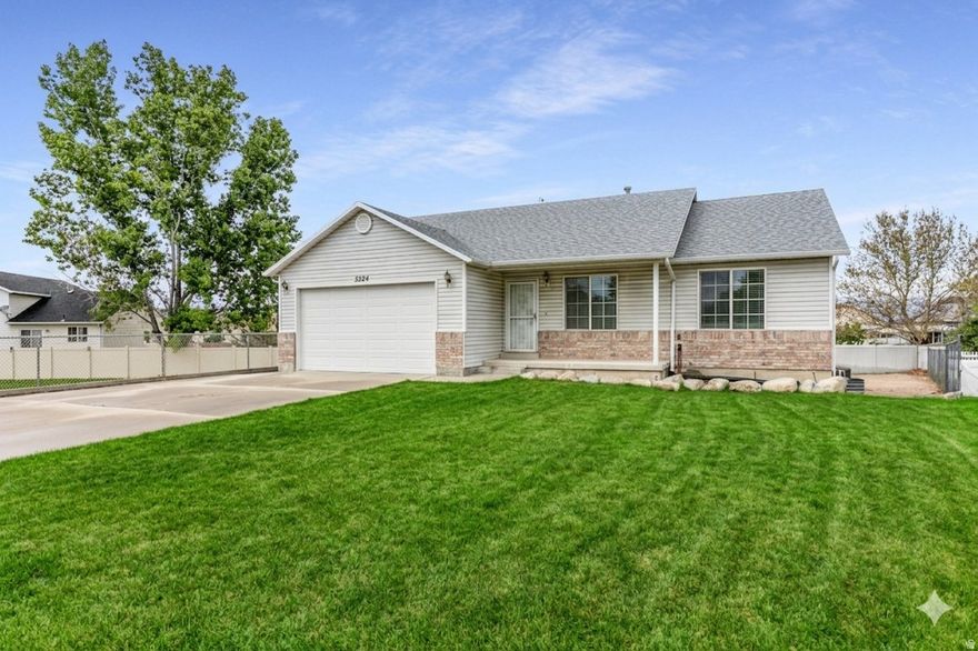 Welcome to 3528 W Crab Apple Cir - a fully remodeled 4 bedroom, 3 bathroom home in the heart of Taylorsville with a fully self-contained basement ADU and separate private entrance. The main level greets you with soaring vaulted ceilings, gleaming hardwood floors, and an open-concept layout that flows seamlessly from the living area into the kitchen. Fresh paint, updated finishes, and abundant natural light make this home feel brand new throughout. Downstairs, the fully finished basement ADU is the crown jewel of this property - a completely independent living space featuring its own full kitchen with white shaker cabinets, subway tile backsplash, gas range, plus a cozy fireplace, private bedrooms, full bathroom, and a separate entrance from the exterior. Whether you're housing extended family, hosting long-term guests, or generating rental income to offset your mortgage, this ADU delivers immediate flexibility and value. Additional highlights include a 2-car garage with built-in shelving, a large lot, and a dedicated staircase leading directly to the ADU entrance - making the two living spaces completely independent. Located in Taylorsville with easy freeway access, top-rated schools, and everything the Salt Lake Valley has to offer just minutes away. Live upstairs. Rent downstairs. This one pays for itself.