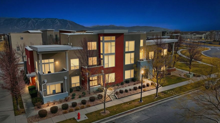 Seller is willing to contribute $5,000 in concessions! This standout 2-bedroom home is a must-see in Daybreak. Oversized windows fill the home with natural light, and the walk-out patio delivers seamless indoor-outdoor living. Designed with intention, the home features oversized 32-inch doorways and a 36-inch hallway, creating a spacious, open feel with easy movement throughout.  An extra-deep garage offers exceptional storage for gear, hobbies, or seasonal items, plus an additional dedicated parking space-a rare and valuable bonus. The layout is both functional and comfortable, with every detail thoughtfully designed for everyday living.  Perfectly positioned in the heart of Daybreak, you'll enjoy walkable streets, picturesque waterways, trails, lakes, and mountain views-where urban convenience meets an active outdoor lifestyle. The HOA provides incredible value, including access to pools, parks, trails, boating, a recreation center, clubhouse, community gardens, snow removal, landscaping, building insurance, and fiber-optic internet.  Just minutes from shopping, parks, lakes, courts, the community center, and the new Bees Stadium, this home offers more than a place to live-it delivers the full Daybreak lifestyle. Square footage is an estimate per county records. Buyer and buyer's agent to verify all information.