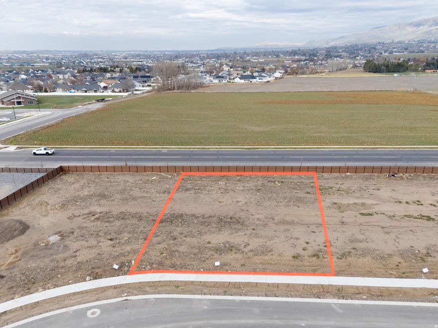 LOT 6 Smiling H Subdivision is an inviting community located in the charming North Logan, Utah. This beautifully designed neighborhood offers a variety of amenities and features that cater to any lifestyle. Residents can enjoy the nearby recreational activities, include pickle ball courts, a splash pad for fun on warm days, and even an ice rink for winter sports enthusiasts. A public library and a police department nearby enhance the community's convenience and security. Families will appreciate the close proximity to schools, making it easy for children to access quality education. Additionally, every building lot is equipped with secondary water connections which is a big saver for the overall water bill. The availability of high-speed fiber internet provides residents with excellent connectivity for work and leisure. The fiber internet bill is part of the low monthly HOA fee of $65. Overall, Smiling H Subdivision offers a harmonious blend of nearby recreational opportunities and essential services, making it an ideal place to call home.