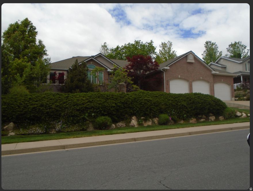 With Mountain peaks and vaulted skies, this is where luxury and comfort rise. This home has 5 beds, 4 baths, a basement retreat, with RV parking-a rare Layton feat. Near Hill AFB and trails so grand, This truly is finest home in all the land.  Half Acre Lot, 3 Car garage, Prime Location!    Square footage figures are provided as a courtesy estimate only and were obtained from County Records .  Buyer is advised to obtain an independent measurement.