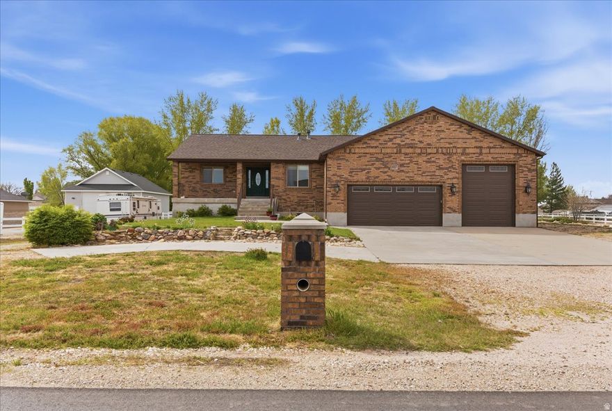 So much room in this all brick rambler on an acre lot. Over 4,500 sq ft finished. Upstairs features an office right as you walk in, 2 good sized bedrooms and a full bathroom are on one side of the house. On the other side is the master bedroom with walk in closet and master bath featuring custom travertine surrounds on the 6 ft tub as well as the walk in shower. The kitchen has a large island, lots of cabinetry, corner pantry, double ovens and cooktop stove. Great room with natural stone gas fireplace with built ins on both sides and large dining area. There is lots of storage in the laundry room as well as a hanging rod and counters to fold clothes. There is a half bath, central vacuum and a 3 car garage with so much storage and 12 ft. garage door on 3rd car for the toys. It is also plumbed for a future garage heater. Down in the basement is a large family room with wet bar and half bath which are great for entertaining. There are 2 water heaters and two furnaces. The other half of basement has rental potential with 2 bedrooms a full bath, and kitchen/family room. This area has an entry from the backyard as well as a door from the basement. Just outside this door are laundry hookups, a big storage room and cold storage under the porch. The large backyard features a storage shed, in ground trampoline, fire pit and a swing set that stays. The roof was replaced about 4 years ago.