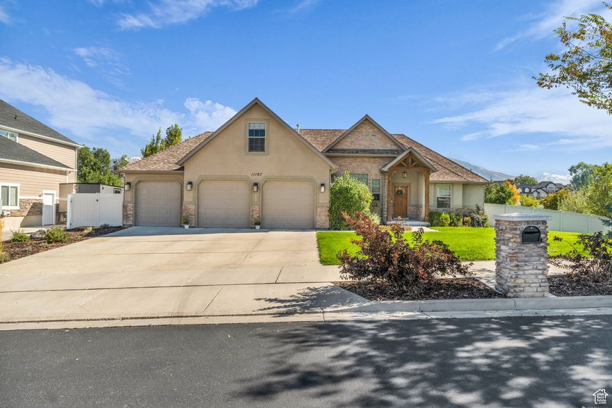 Nestled in South Jordan's highly sought after Aspen Crest neighborhood, this rare half acre property offers a one-of-a-kind setting with Willow Creek running through the backyard. Imagine waking up to the peaceful sound of moving water and watching wildlife come and go. A mountain-like escape right in the heart of the valley. The yard is beautifully landscaped with mature trees, fruit trees, and sweeping views of the Wasatch Mountains. Inside, you'll find 7 spacious bedrooms, a bright open floor plan, walkout basement, bonus loft, and 3 car garage. Enjoy easy access to I-15 along with endless nearby shopping, dining, and entertainment options. Serenity and convenience all in one remarkable home.