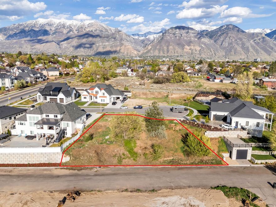 CUL-DE-SAC LOT! Rare opportunity to build your dream home on a 0.39-acre lot in a quiet cul-de-sac in the Provo's Grandview North neighborhood. Sitting right where Provo meets Orem, you get the best of both cities with easy access to I-15, dining, and shopping. There is plenty of room to build exactly what you want. The lot's natural slope positions you to build a walkout basement, AND the road running behind the lot gives you the option to add rear garage access. No HOA.