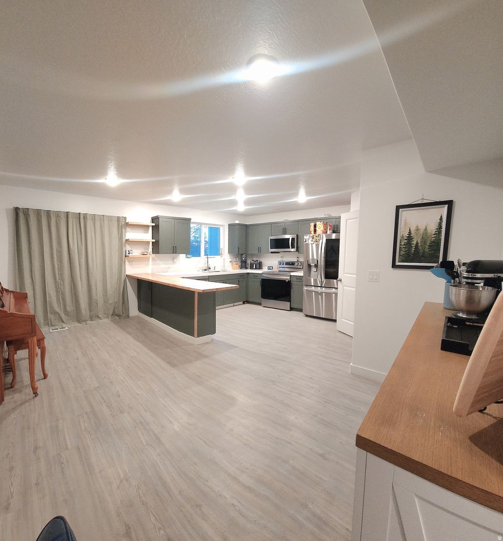 Photo of 615 PLUM LN, Ogden, UT 84414 (MLS # 2141852)