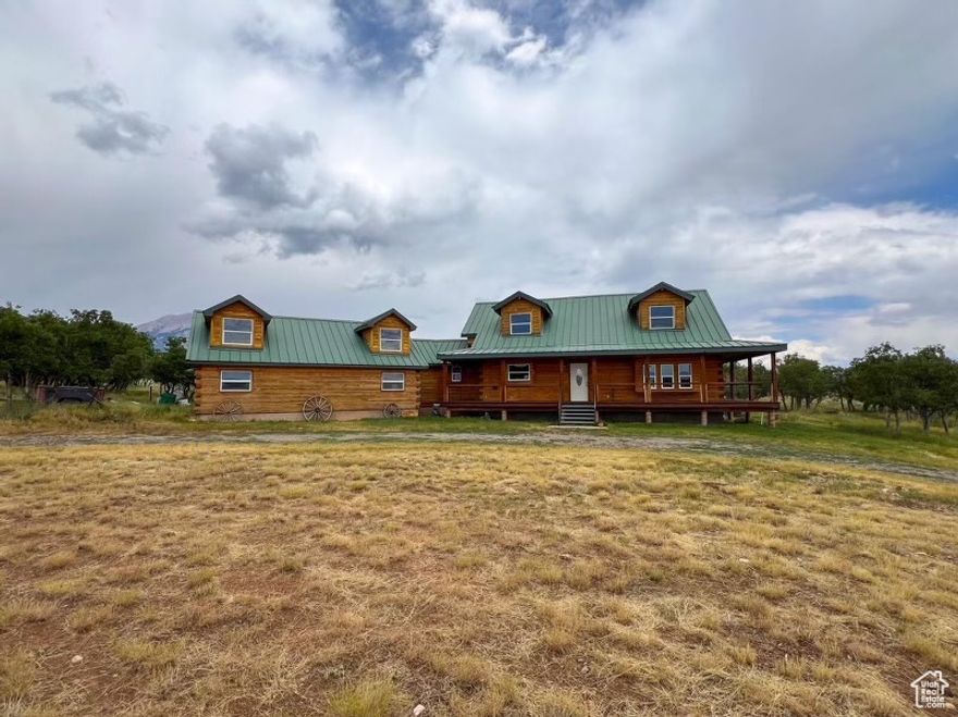 Mountain Serenity Meets Modern Comfort Nestled on 5 pristine acres in the majestic LaSal Mountains, this inviting cabin offers panoramic views and peaceful seclusion. Featuring 2 spacious bedrooms, 2.5 baths, and a wraparound deck designed for stargazing or morning coffee, it blends rustic charm with everyday luxury. Whether you're seeking a weekend escape or year-round retreat, this property is a rare find in a breathtaking setting.