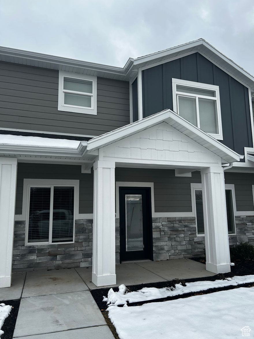 **PICS ARE OF A DIFFERENT UNIT; COLORS/FINISHES MAY VARY** $20K DOWN PAYMENT ASSISTANCE MAY BE AVAILABLE! Brand new! Not your typical townhome: enjoy LARGE bedrooms, an OVERSIZED 2-CAR GARAGE (which can fit a full-sized truck!), and a community grassy area behind home for outdoor play space & recreation. UPGRADES galore: QUARTZ counters, stainless steel appliances, LVP (on main), 2-tone paint, VAULTED or tray ceilings in the bedrooms, large 50-gallon water heater, BLINDS (yes, blinds included!), and more! Property taxes not assessed yet. Square footage per building plans. School boundaries are estimated. One of owners of the selling entity is a licensed real estate agent in the state of Utah. Listing agent related to seller. Buyer/agent to verify all