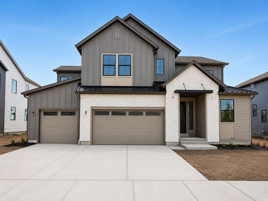 Step into refined comfort in the peaceful community of The Crossings at Lake Creek. Thoughtfully designed for both functionality and style, this home offers an ideal blend of open living spaces and private retreats. Enjoy quiet moments on the covered patio, gather with ease in the expansive great room, or unwind in the beautifully appointed main-level primary suite with a spa-inspired bathroom featuring a freestanding soaking tub. The gourmet kitchen serves as a true focal point, featuring an oversized island and a premium Gas cooktop, perfect for both everyday living and entertaining.  A dedicated main floor office creates an ideal work-from-home environment. Designer-selected finishes curated by an award-winning team bring elevated style and cohesion throughout the home. With four spacious bedrooms, three and a half beautifully finished bathrooms, and an unfinished basement ready for future customization, this home offers both immediate comfort and long-term potential. Square footage figures are provided as a courtesy estimate only and were obtained from the builder. Buyer is advised to obtain an independent measurement.