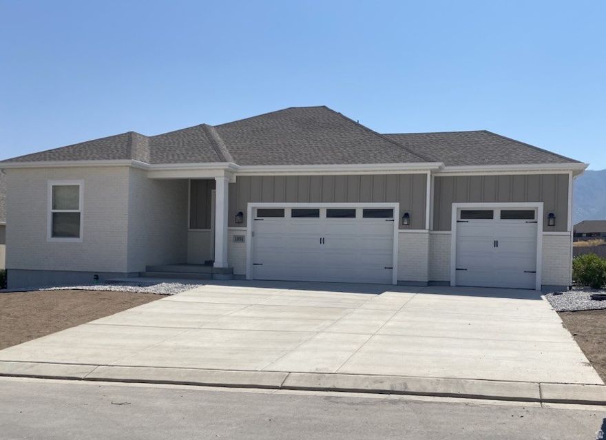 Over half an acre of land! Plenty of space to make this house your home! No stairs! Front yard landscaping done! And so much more!