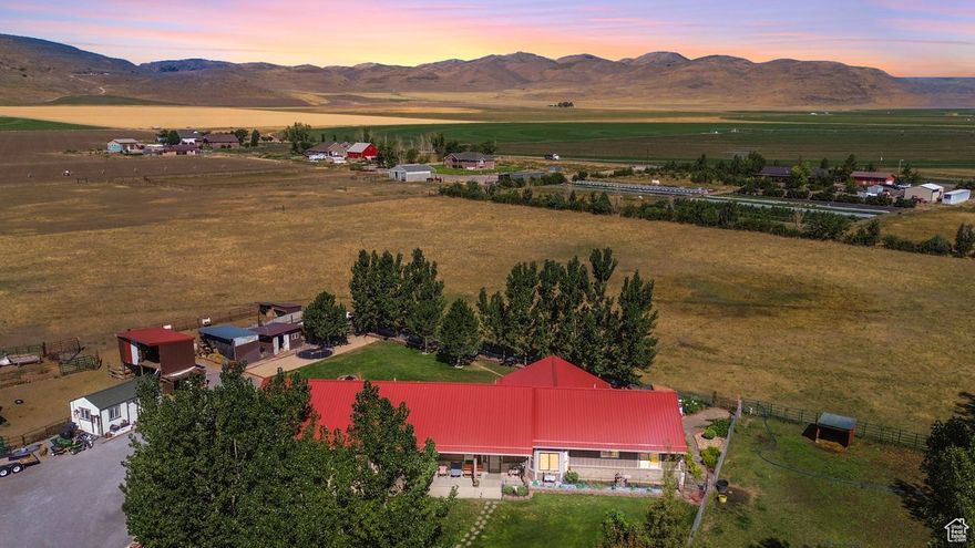 Rare, Hard to Find and Absolutely Beautiful-1 level Ranch Style Home & Horse Property situated on 6.5 irrigated acres in Tremonton. This home features 3 bedrooms (master bed & bath has walk in closets), 2 bathrooms, large kitchen, granite counter tops throughout, custom walnut cabinets, family room, laundry room, large 2 car garage (with a partial bathroom inside), metal roof, private well, Generac generator, wheelchair ramp, outdoor water faucets, fully landscaped, and several outbuildings which include: 2 chicken coups, 2 hayseeds, a livestock shelter and a she shed.  Buyer/Buyer's Agent to verify all information for accuracy.