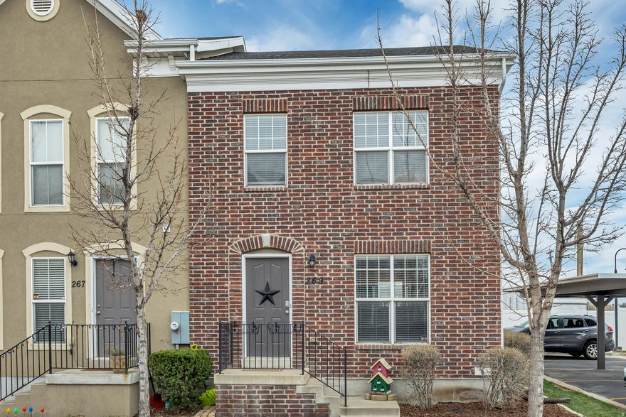 Rare row-end townhome with a main-level half bath in a quiet, centrally located Murray community. This move-in-ready home features a bright, open layout with vaulted ceilings, abundant natural light, and an updated kitchen with granite countertops and stainless steel appliances. Upstairs offers three spacious bedrooms and two bathrooms, including select en-suite layouts. The fully finished basement provides a conforming fourth bedroom or flexible living space with an additional bathroom-ideal for guests or a home office. Includes two parking spaces (one covered) and is conveniently located near parks, the Jordan River Parkway, TRAX, shopping, dining, and quick access to I-15.