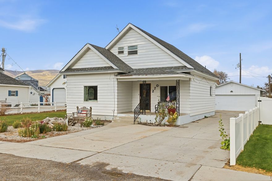 Adorable twostory home in the heart of Garland! Conveniently located close to schools and supermarkets, this charming property sits on a 0.25-acre lot with a detached oversized 2-car garage/shop, a spacious driveway perfect for RV parking, a large garden area with various berry bushes and a nectarine tree, and a well-cared-for partially fenced yard. Enjoy relaxing on the big covered front porch during warm summer days. Step inside to find original hardwood floors, spacious bedrooms, and a functional layout featuring 4 bedrooms, 1.5 bathrooms, main-level laundry, and a large back room ideal for storage, hobbies, or gatherings. Recent updates include a newer furnace, water heater, windows, metal roof, and carpet, making this a solid and move-in-ready home for any buyer! Buyer to verify all information and upstairs sq footage was an estimate. Don't miss this opportunity!
