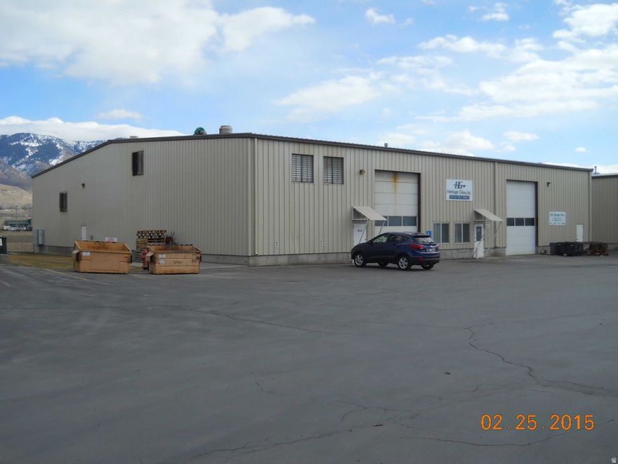 Smithfield UT Unique Warehouse Space with heavy 3 phase power, 16' overhead door and floor drain. Industrial park location. Small office w AC .