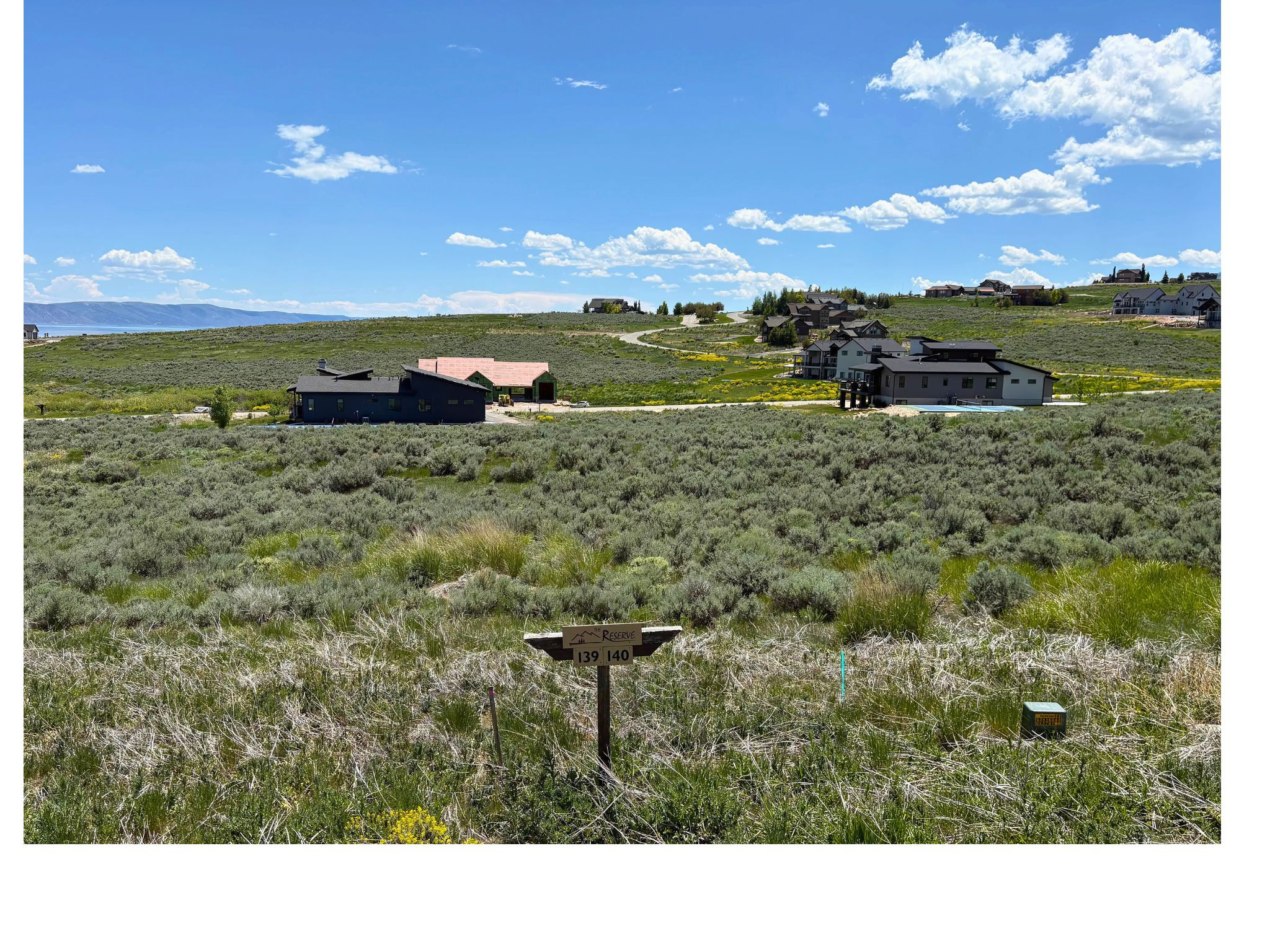 Come build your dream cabin or permanent residence on this great lot located in The Reserve at Bear Lake. Flat to gently sloped lot, easy to build on, paved roads, power, water, sewer stubbed. Enjoy fantastic amenities with clubhouse, fitness room, two heated pools (seasonal), hot tub (year round), splash pad, sports court, playground and gated beach access to Bear Lake! Fish Haven Canyon access for hiking, mountain biking, ATV/UTV, snowmobiling and snowshoeing. Short term rentals allowed.