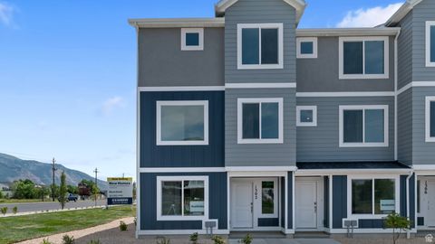 Photo of 345 E 1275 N #128, Harrisville, UT 84404 (MLS # 2116599)