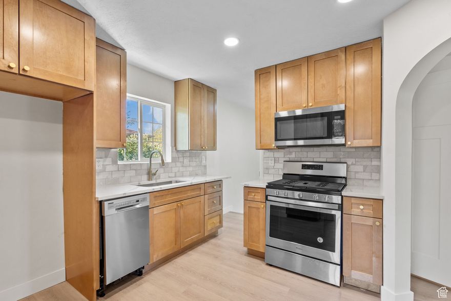 ***Offering  $15,000 to BUY DOWN INTREST RATE or concessions. Charming 1924 Bungalow in Prime Sugar House Location Welcome to 1946 S 1400 E - a beautifully maintained single-family home blending vintage character with thoughtful modern updates. Located in one of Salt Lake City's most sought-after neighborhoods, this inviting residence offers 2 bathrooms, a finished main floor with 1,284 sq.ft. of living space, plus a fully finished basement that provides additional comfort and flexibility. Situated on a generous 7,405 sq.ft. lot, the property features a spacious yard perfect for outdoor entertaining, gardening, or future expansion. Inside, you'll find original architectural details paired with updated finishes that enhance both functionality and style. Just steps away from Sugarhouse Park, top-rated schools, boutique shopping, dining, and entertainment - this home is ideal for first-time buyers, savvy investors, or anyone looking to own a piece of local history in a vibrant, walkable community. Don't miss your chance to call this charming Sugar House gem your own!