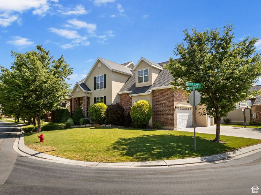 Charming Family Home with Income Potential in Mapleton! Welcome to your dream home in one of Mapleton's highly sought-after neighborhoods! Nestled in a quiet, family friendly community known for its top rated schools and strong sense of community, this beautiful residence offers comfort, functionality, and flexibility; all on one of the largest lots in the neighborhood!  Step inside to find fresh paint and brand new carpet throughout, making this home truly move-in ready. The spacious kitchen features granite countertops and stainless steel appliances, perfect for family meals or entertaining guests. Enjoy gathering in the large family room, complete with a fireplace to provide a cozy ambiance on chilly evenings. A large mudroom and a dedicated office/den on the main floor add practical living space, while a bonus room upstairs easily qualifies as an additional bedroom or recreation area. The spacious 3 car garage includes a 220 outlet for quick charging on EV's.  What truly sets this home apart is the fully finished mother-in-law apartment with a private entrance, offering fantastic ADU rental income potential or multi-generational living situations.  Enjoy morning walks and evening playtime with the park directly across the street and a large community park just steps away. The generous lot provides ample outdoor space for gatherings, gardening, or future additions. A true forever home.