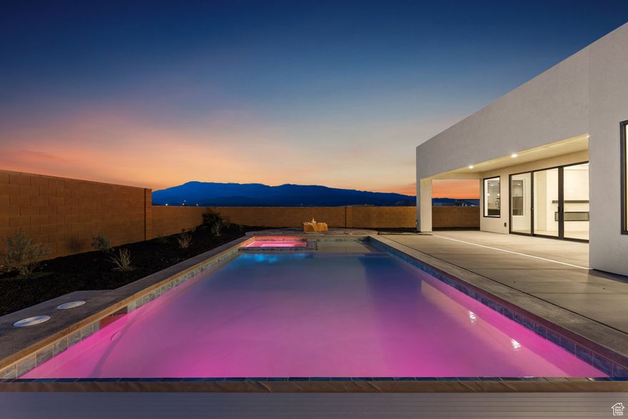Discover your dream home at The Ridge at Zion Vista, where modern design meets breathtaking views of Pine Valley Mountain. This stunning home is filled with all the upgrades and thoughtful details to elevate your lifestyle. Step inside to a gourmet kitchen with a sleek backsplash and Bosch appliances. The openconcept floor plan is complemented by upgraded carpet&flooring, creating a warm & inviting space perfect for entertaining or relaxing. Unwind in the spa-like owner's suite with garden tub and large closet. The heart of the home is the living room, where a 16' sliding glass door opens to a spacious patio seamlessly blending indoor&outdoor living while showcasing those incredible Pine Valley Mountain views. This home is the perfect combination of luxury, comfort, and scenic beauty.