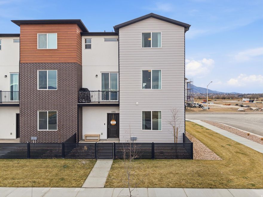 Skip the construction timeline and step into this well-maintained three-level town-home offering functional, light-filled living space. Enjoy wide open views from the kitchen and living area. A bedroom and full bathroom on the main level just off the front door and over-sized garage is perfect for a workspace or guest bedroom. The community is growing and is full of energy, and just moments away from I-15 freeway access.