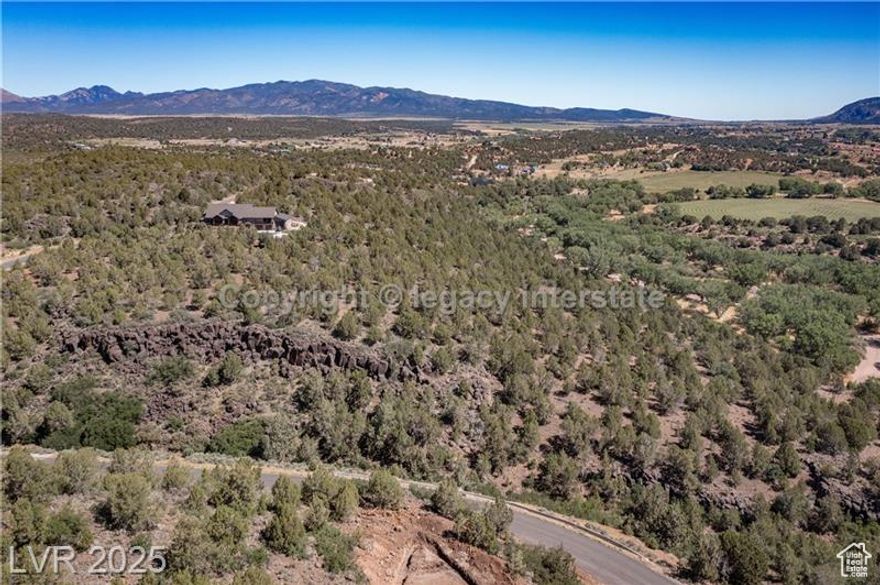 Discover your slice of paradise in Kolob Ranch Estates, an equestrian-friendly community in New Harmony, UT-ideally located between St. George and Cedar City. This spacious 5-acre lot offers direct access to miles of riding trails with panoramic views that stretch for miles. Ride from your property into nature's beauty! Enjoy the convenience of paved roads and utilities ready at the street, including electric, natural gas, and a water meter (1 share in Mountain Springs Water Company included). Septic system is needed. Whether you're seeking peace, space, or adventure, this lot offers the best of all worlds!