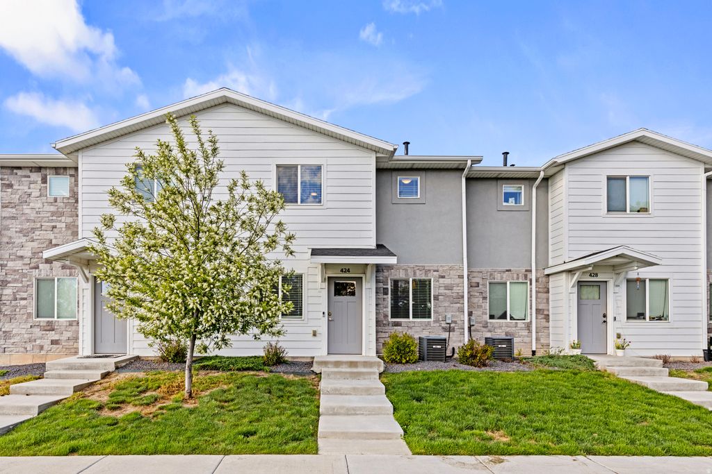 Photo of 424 E CANFIELD DR N #11, Ogden, UT 84404 (MLS # 2151001)