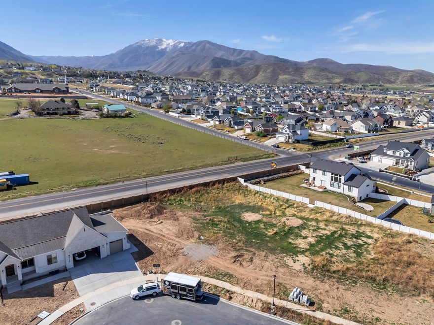 Build your dream home on this large luxury lot tucked in a quiet cul-de-sac in Salem. Enjoy stunning mountain views in a peaceful, well-located setting. We've partnered with some of the best builders in the valley as preferred builders to help bring your vision to life. The lot is build-ready with utilities available, making it a smooth and efficient process to get started.