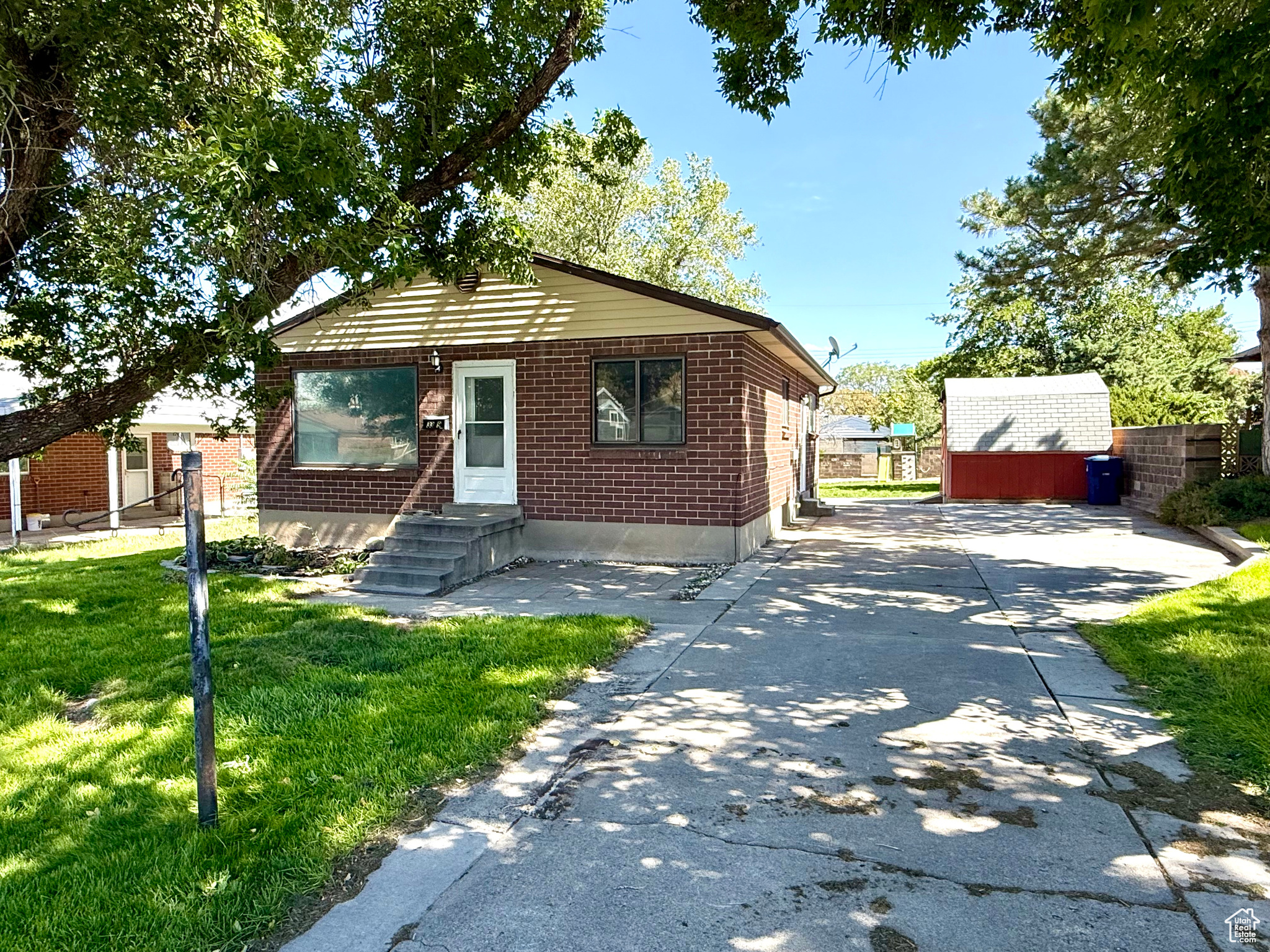 ***Multiple Offers Received*** Don't miss this beautifully maintained red brick rambler in a fantastic Magna location! Nestled among mature trees, this home offers 4 beds/ 2 baths, and plenty of updates, including new carpet. The spacious lot features two storage sheds, a playground set, and ample parking with RV space. Located just four houses away from Pleasant Green Park and the Magna Fitness & Recreation Center, you'll enjoy unbeatable access to outdoor activities. Shopping, schools, and convenient commuting routes-all just minutes away. Clean, move-in ready, and full of charm, this home is the perfect blend of comfort and convenience. Schedule your private showing today. Feel free to reach out to the Listing Agent with any additional questions that you might have. This home does qualify for FHA financing, but it has not met the 90 Day seasoning requirement as of yet. The 90 seasoning requirement will be met on 10/9/25. Feel free to reach out to the Listing Agent with any questions that you might have. Square footage figures are provided as a courtesy estimate only and were obtained from County Records. Buyer is advised to obtain an independent measurement. Buyer & buyers agent to verify all accuracy, including sq ft., acreage, zoning, & HOA information. The property information herein is derived from various sources that may include, but not limited to, county records and the Multiple Listing Service, and it may include approximations. Although the information is believed to be accurate, it is not warranted and you should not rely upon it without personal verification. The Seller has never resided in the home. Seller is part owner of the listing brokerage, but is not a licensed agent. The Broker for Aspen Ridge Real Estate helps to manage the Seller's company.